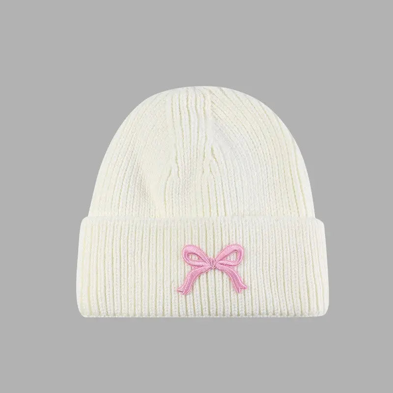 Soft Ribbed Knit Bow Accent Beanie Cream