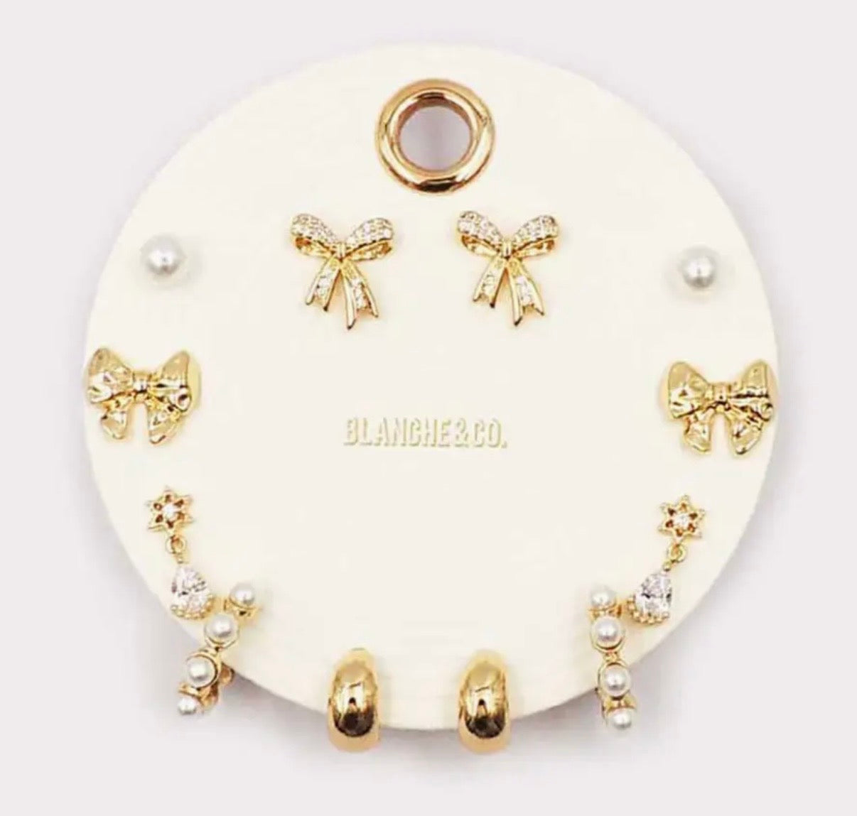 Pearls, Bows, and Hoop Earrings